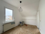 Mitten in Mainz-Finthen Rentables 4-Parteienhaus mit eigener Duplex-Garage - Bild4