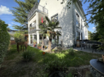 Schicke Maisonettewohnung mit Terrasse und schönem Garten - Bild8