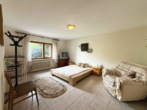 Freistehendes Einfamilienhaus mit Terrasse auf großem Grundstück - Bild11