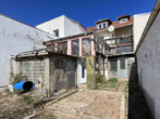 Sanierungsbedürftiges Einfamilienhaus mit Balkon und Garten in ruhiger Lage von Essenheim - Bild2