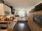 Moderne, neuwertige Eigentumswohnung mit Terrasse und kleinem Garten im Reihenhausstil - Bild5