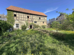 Historisches Zweifamilienhaus mit Scheune und sonnigem Garten in guter Lage - Bild2