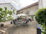 Charmantes Zweifamilienhaus mit vielseitig nutzbarem Untergeschoss und großem Innenhof - Bild2