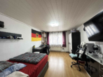 Charmantes Zweifamilienhaus mit vielseitig nutzbarem Untergeschoss und großem Innenhof - Bild6