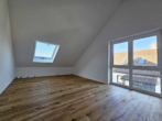 **Neubau-Erstbezug in Stadecken-Elsheim** Luxuriöse Doppelhaushälfte in gewachsener 1-A Wohnlage - Dachgeschoss